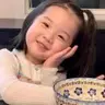 李**