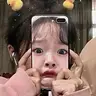 沈**